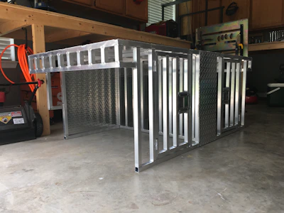 A heavy-duty custom K-9 crate built for law enforcement vehicles.