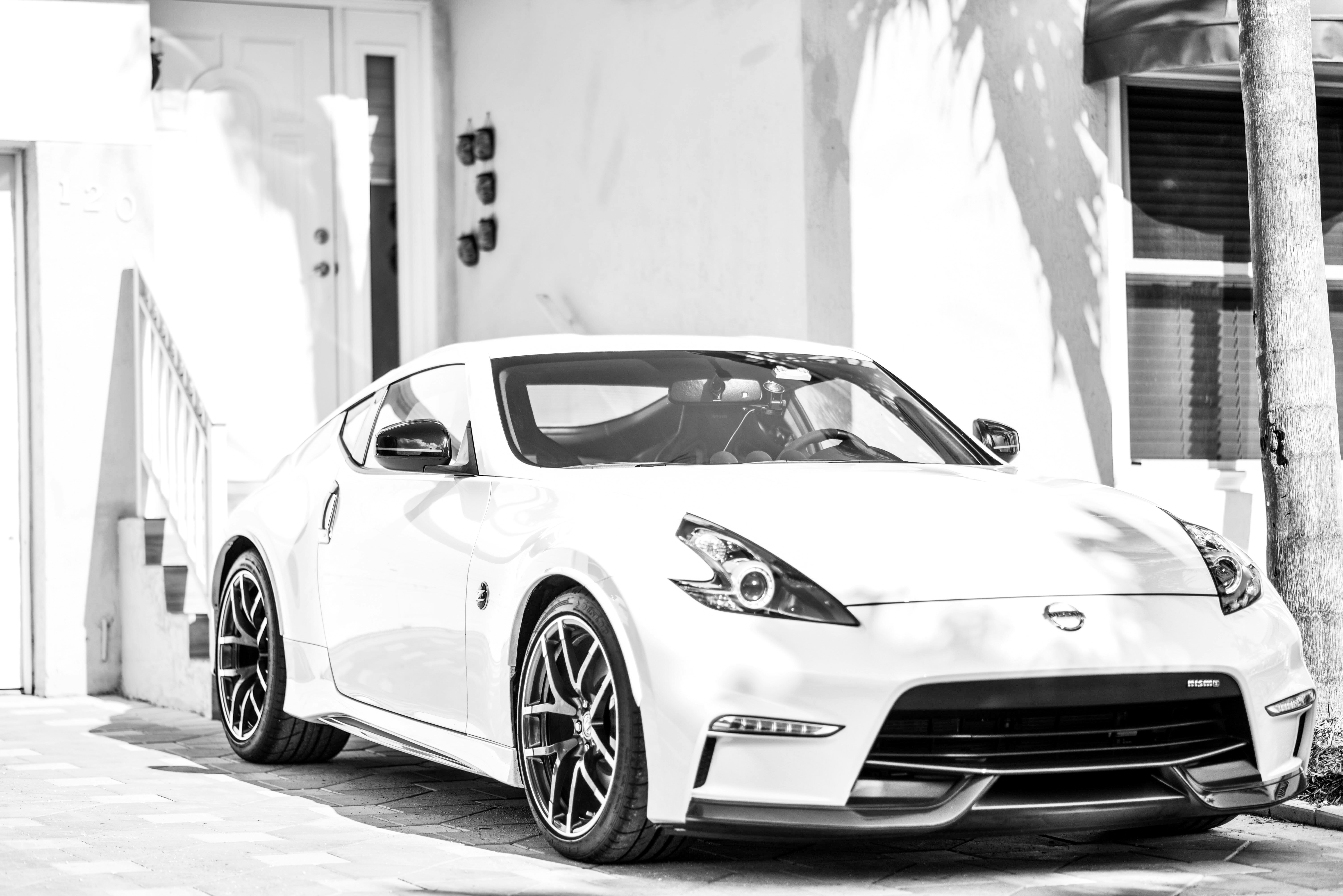 grayscale photo of mercedes benz coupe