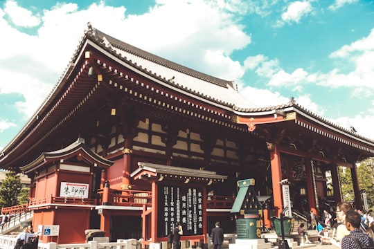 red and brown temple under blue sky during daytime in Sensō-ji Japan