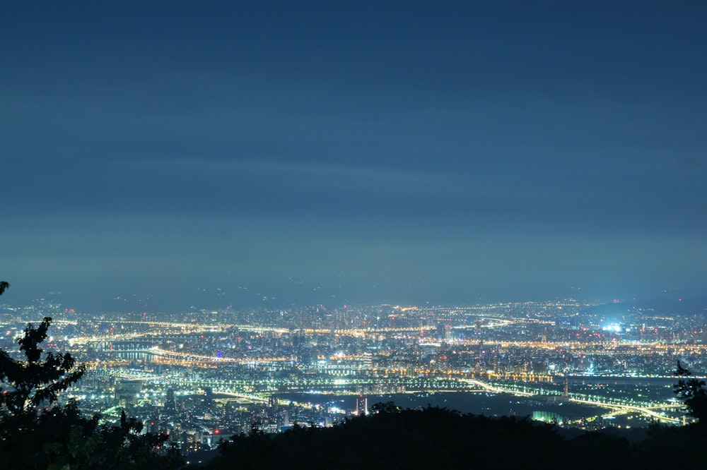 city skyline during night time