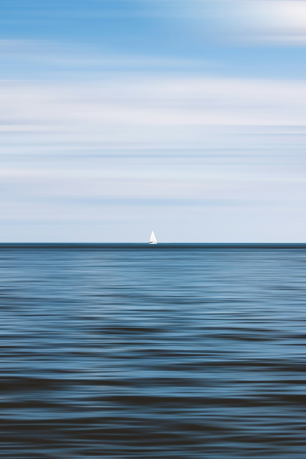 white sailboat on sea during daytime