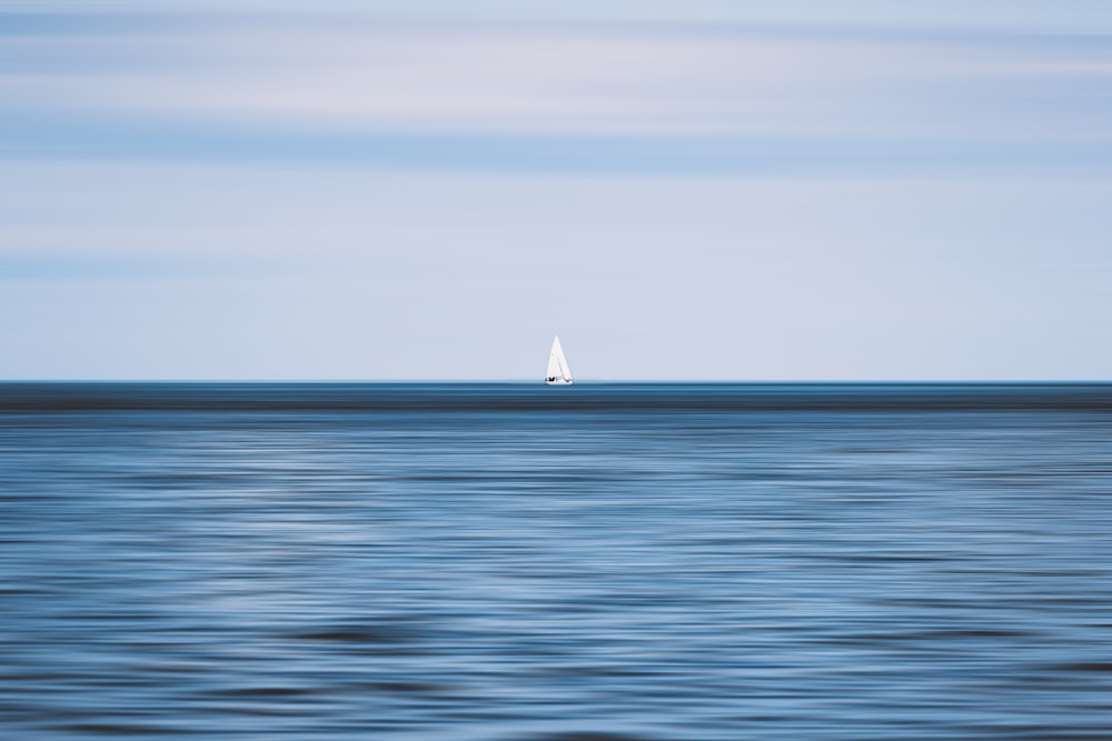 sailboat on sea during daytime
