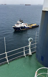 black and brown ship on sea during daytime