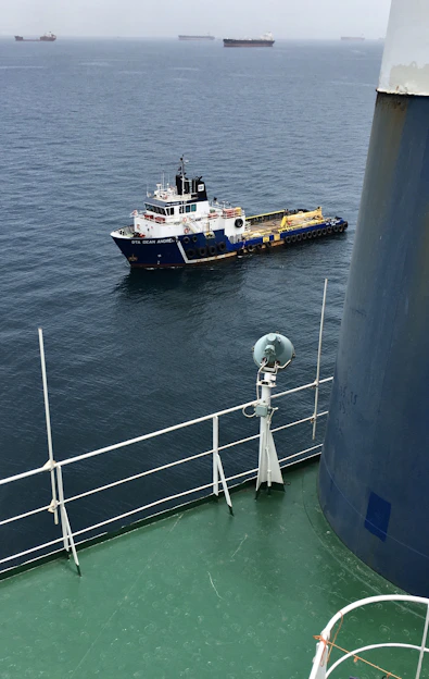 black and brown ship on sea during daytime