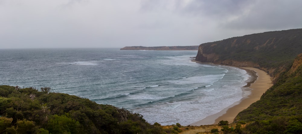 a view of the ocean from a cliff