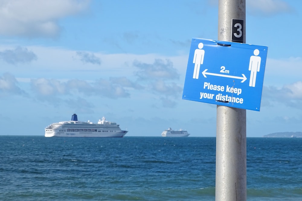 white cruise ship on sea under blue sky during daytime