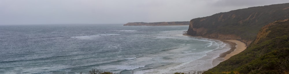 a view of the ocean from a cliff