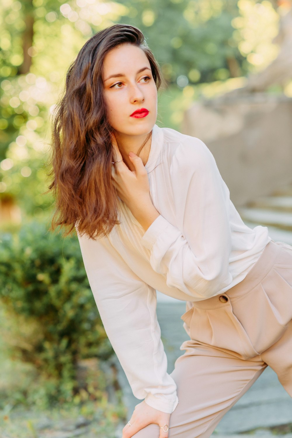 woman in white long sleeve shirt