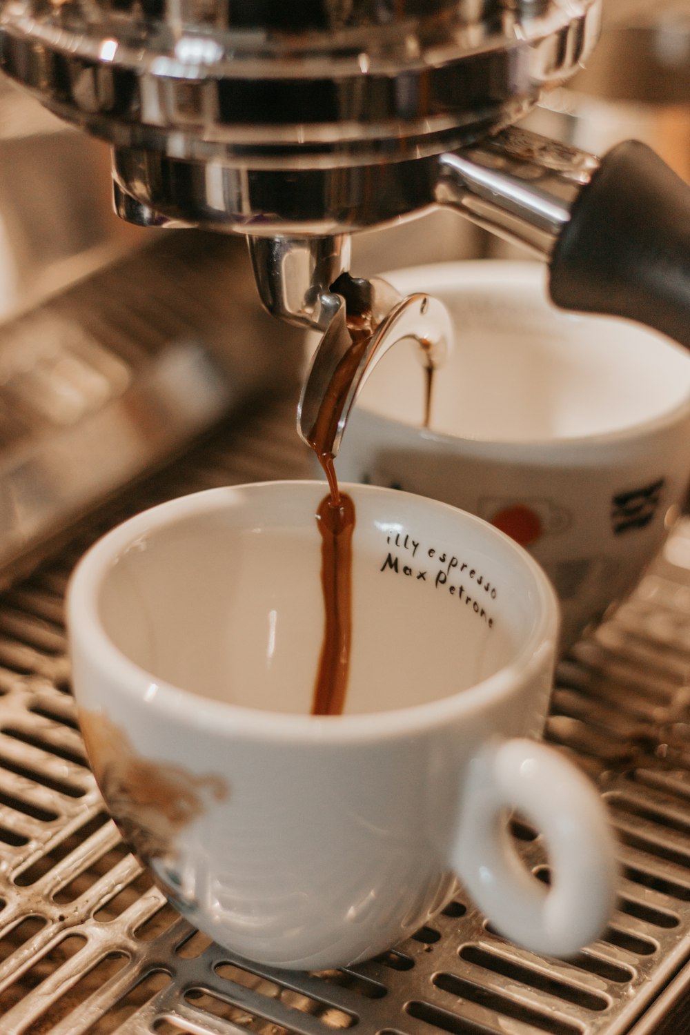 white ceramic cup with coffee