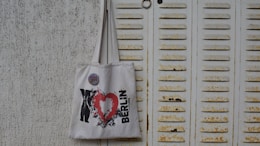 white and red tote bag