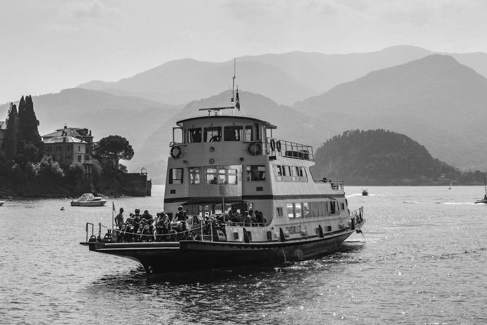 grayscale photo of ship on sea