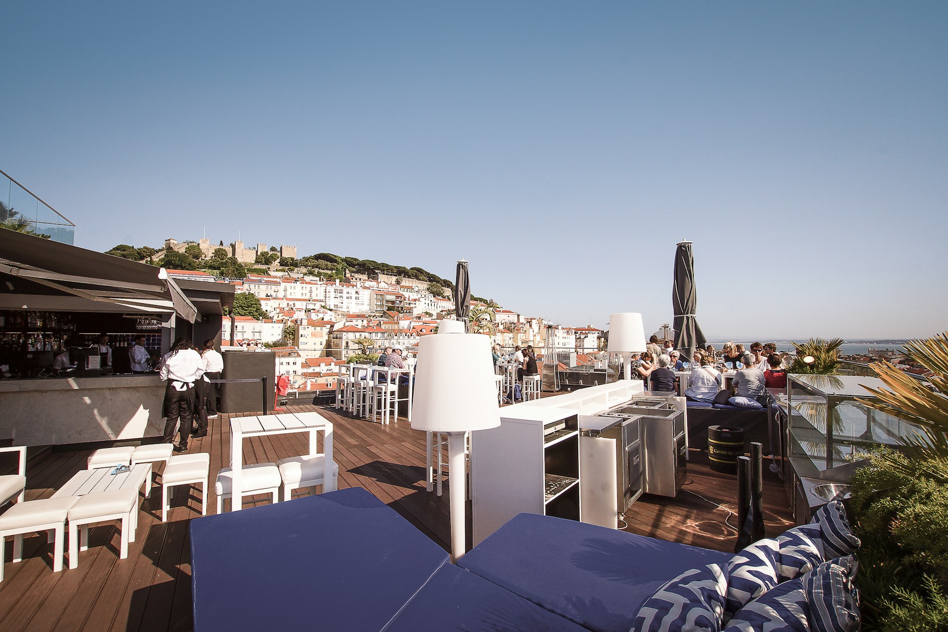 woman wearing yellow long-sleeved dress under white clouds and blue sky during daytime