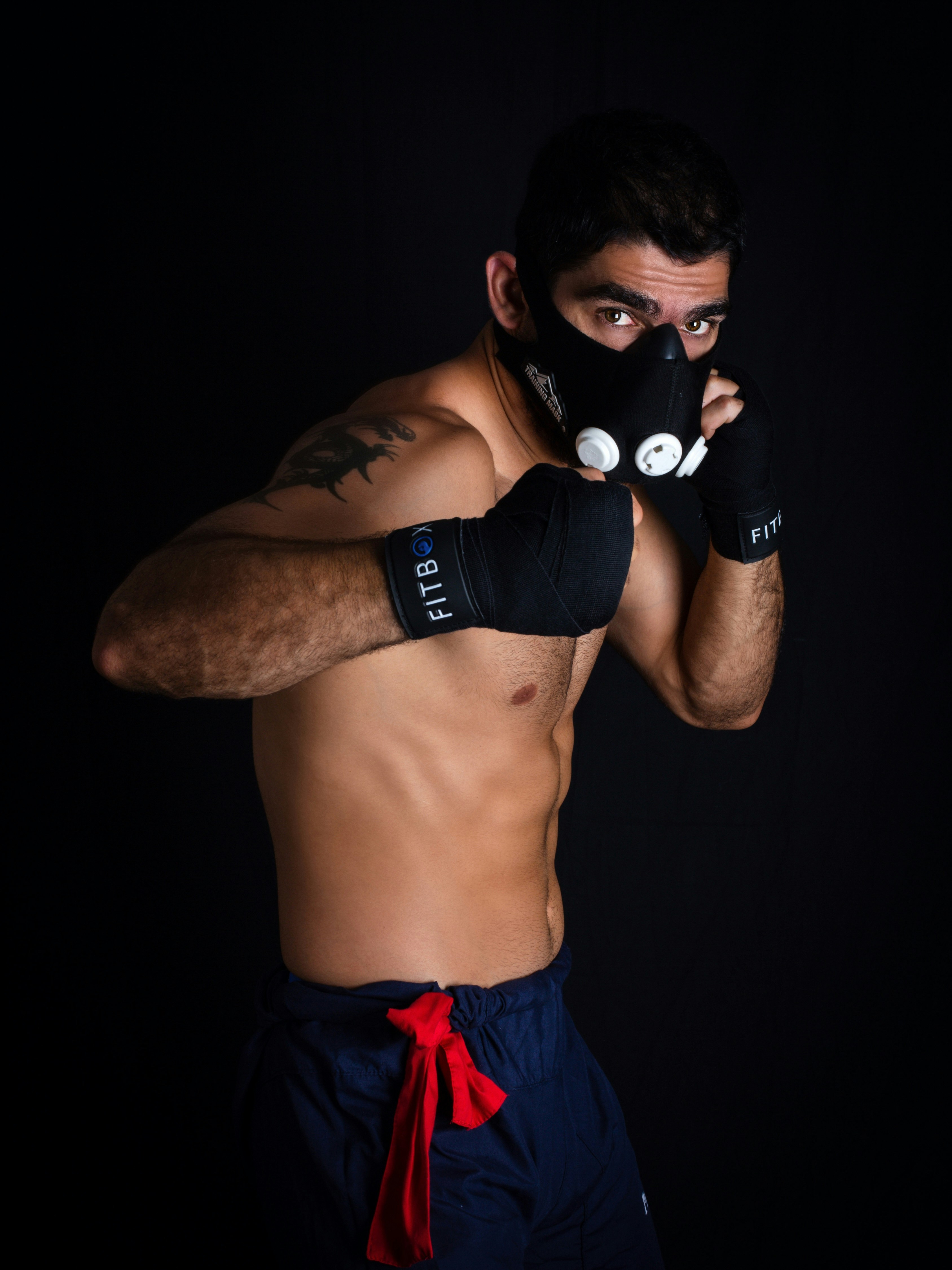 Muay Thai Fighter Fighting with corona virus wearing mask