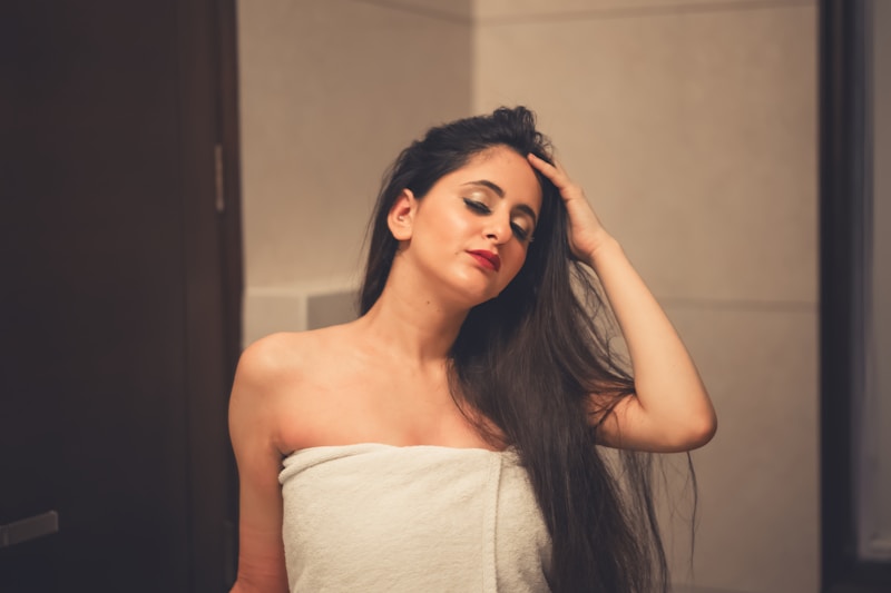 Elegant woman in white tube dress