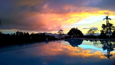 Sunset over Desert Sky Estates highlighting the community pool.