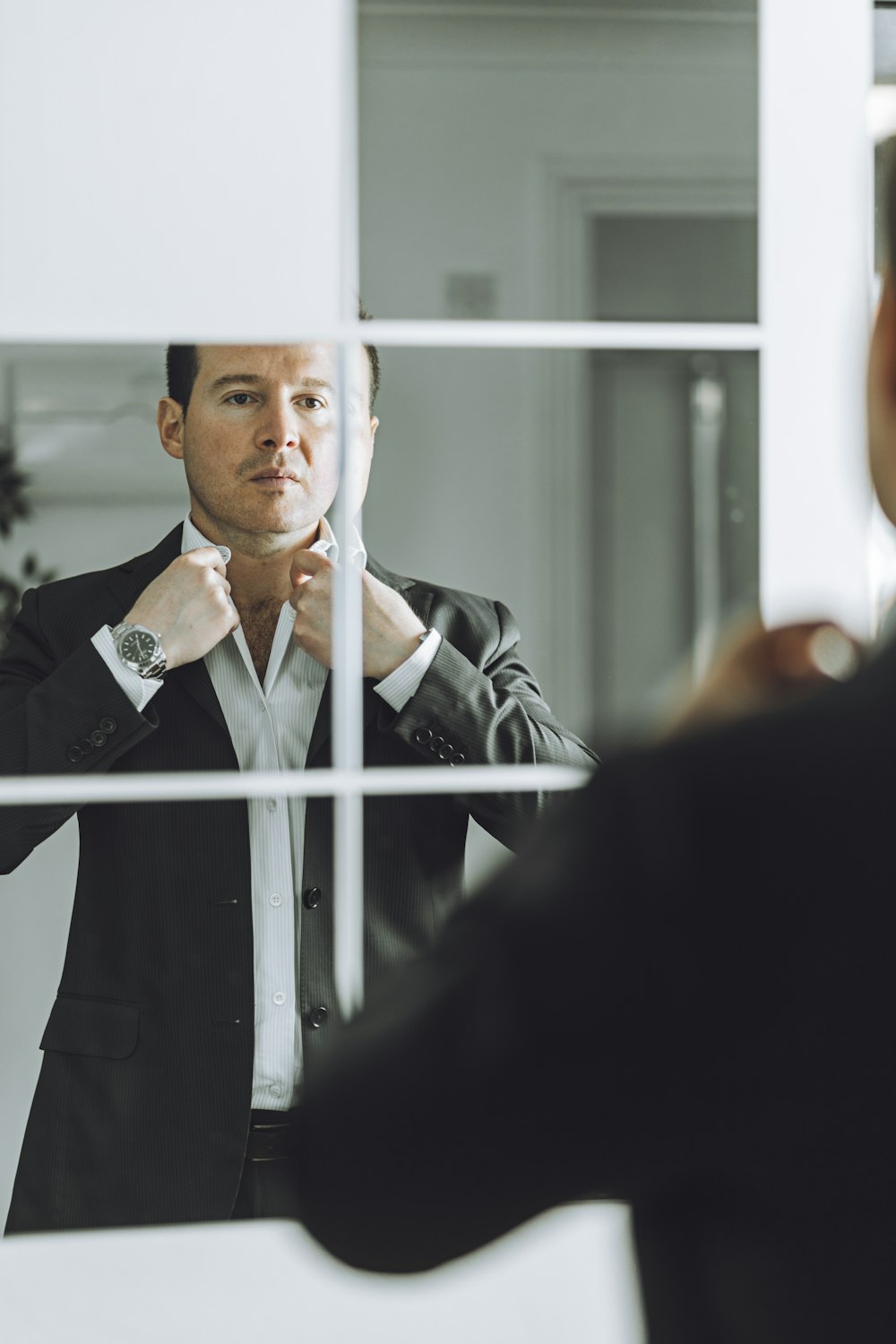 man in black suit jacket