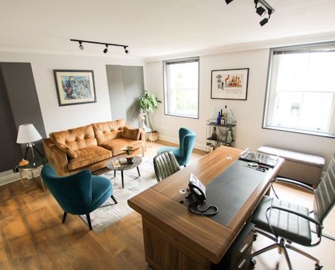 brown wooden table with chairs