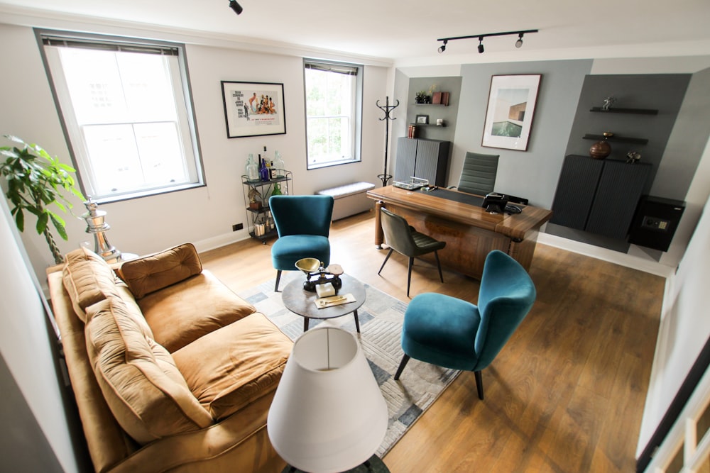 white and black round table near brown sofa