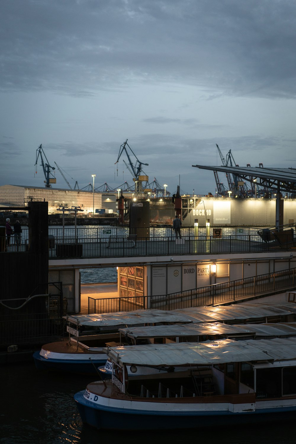 white and brown ship on dock during daytime