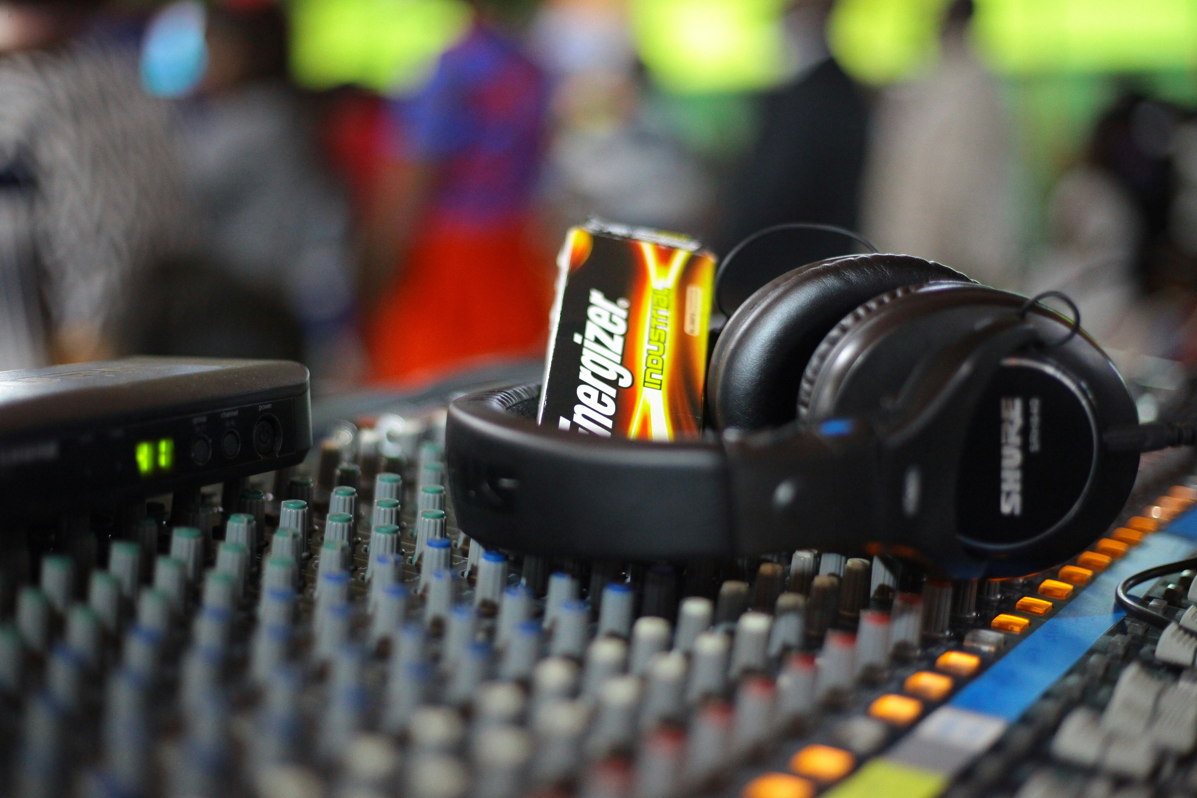 black and yellow corded headphones