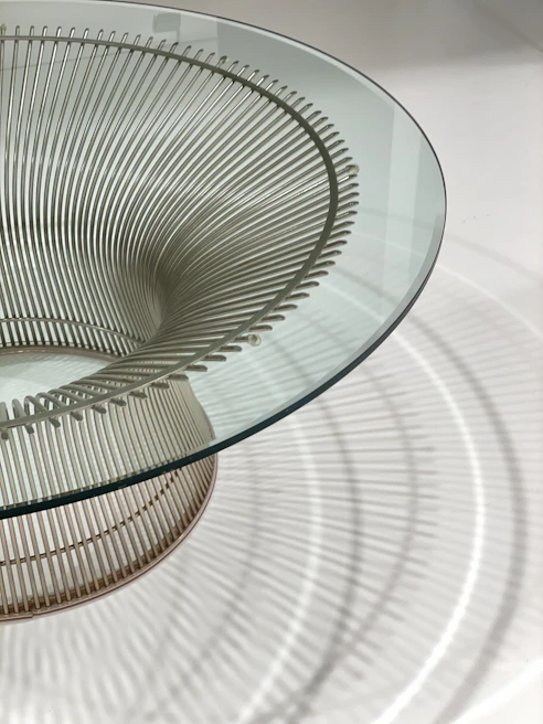 A round metal side table with a glass top, featuring a 'Get Price' button prominently displayed