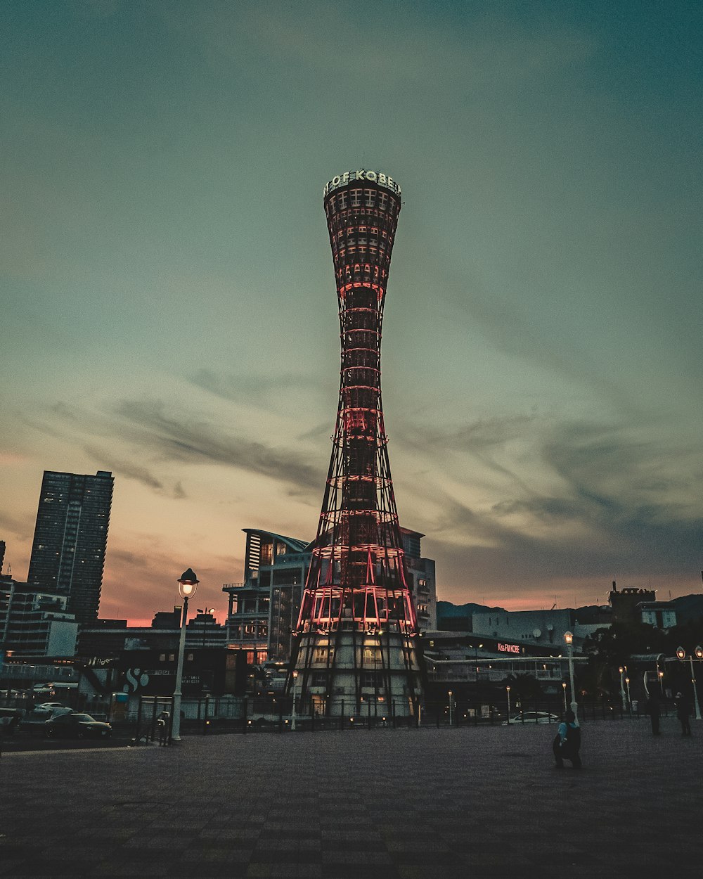 black and white tower under cloudy sky during daytime