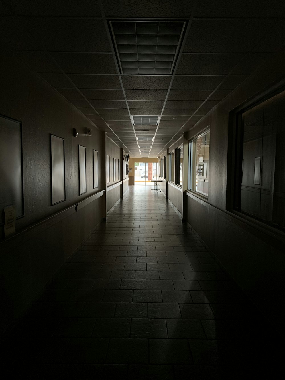 hallway with white ceiling lights