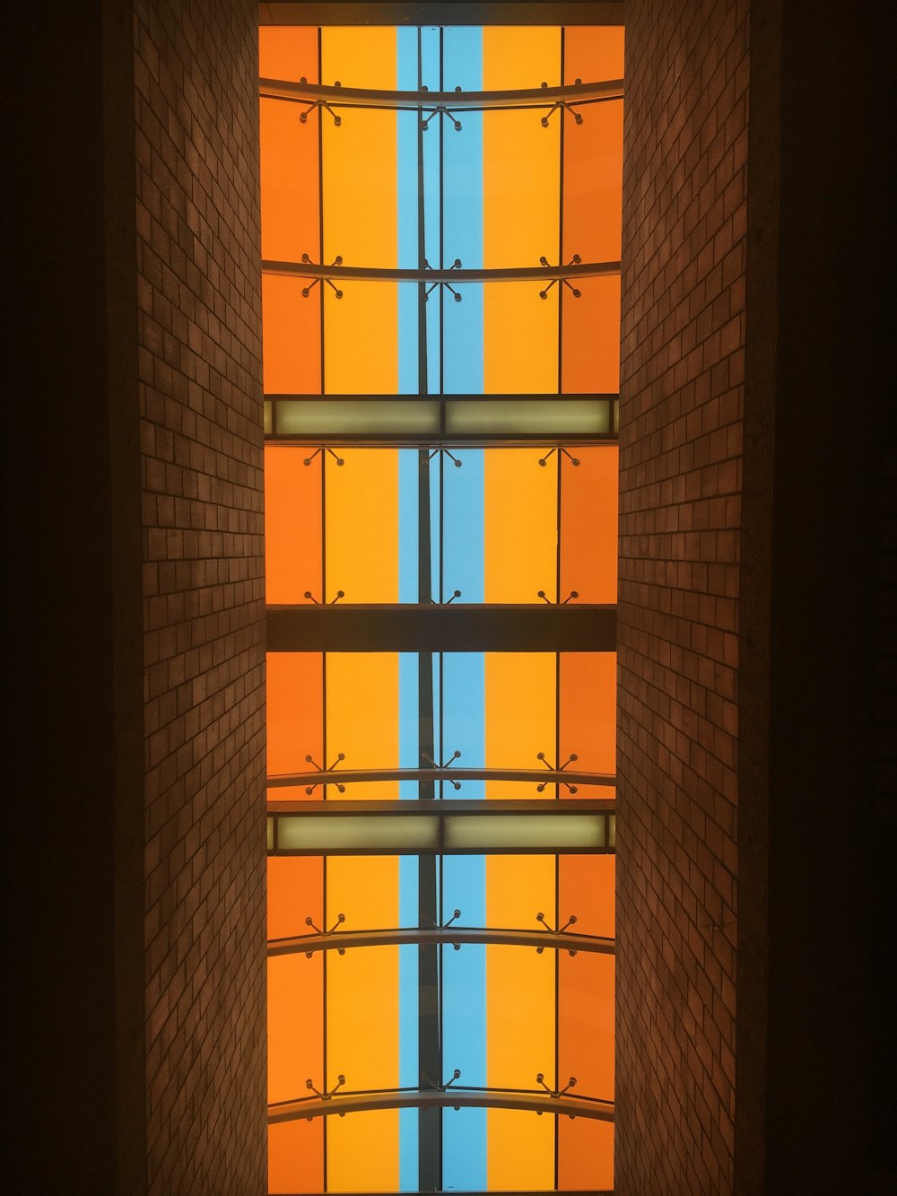 brown metal window frame during daytime