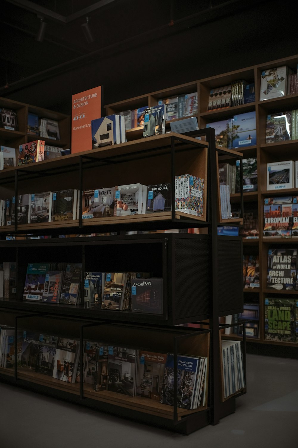 books on black wooden shelf