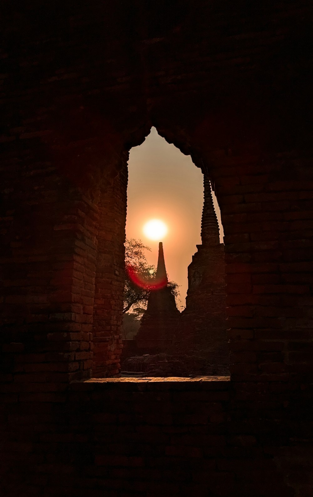 red and brown concrete tunnel