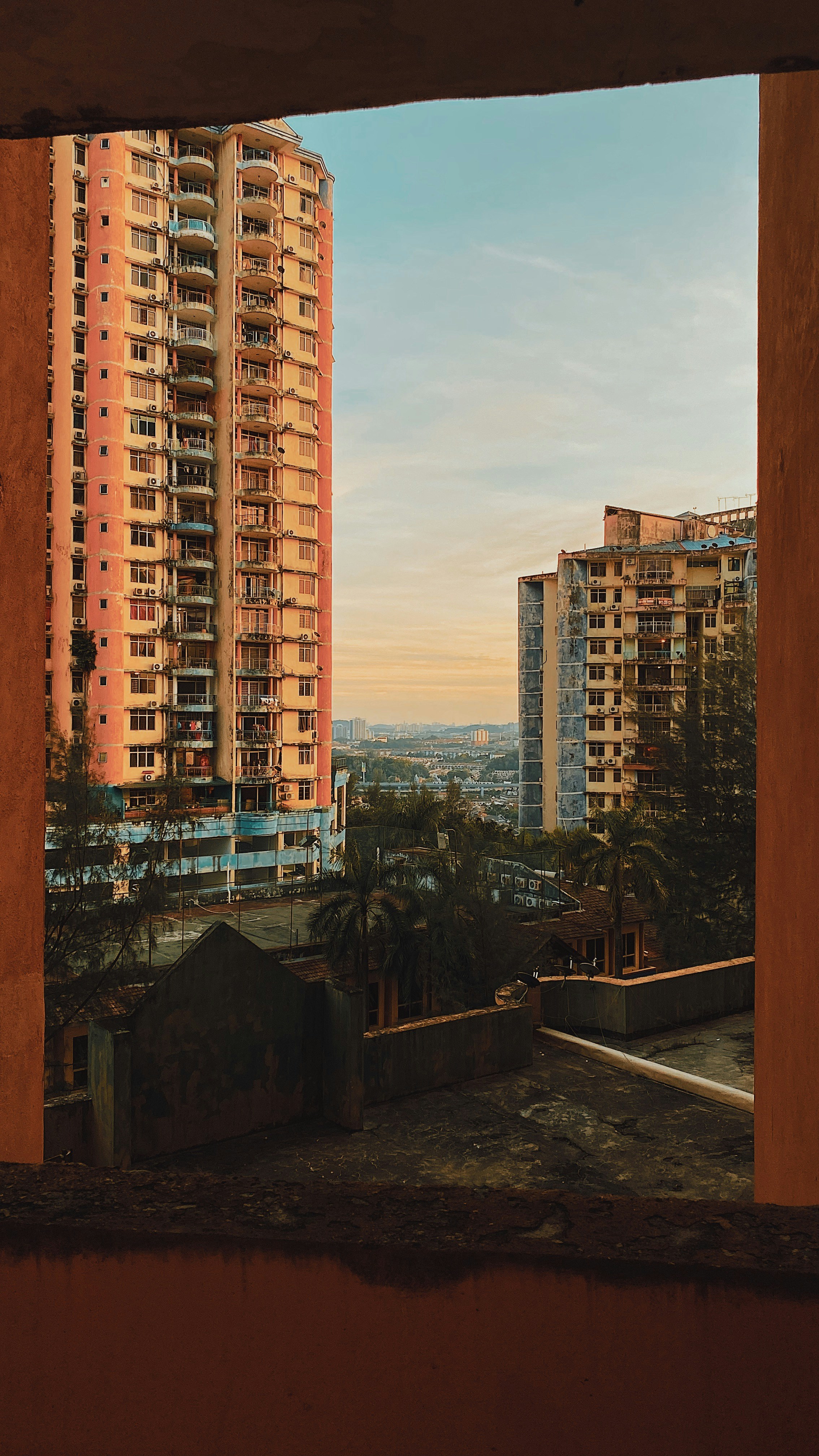 brown and white concrete building during daytime