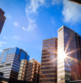 white and blue concrete building under blue sky during daytime