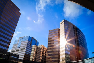 white and blue concrete building under blue sky during daytime