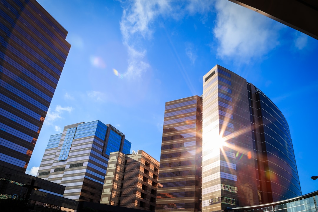 white and blue concrete building under blue sky during daytime