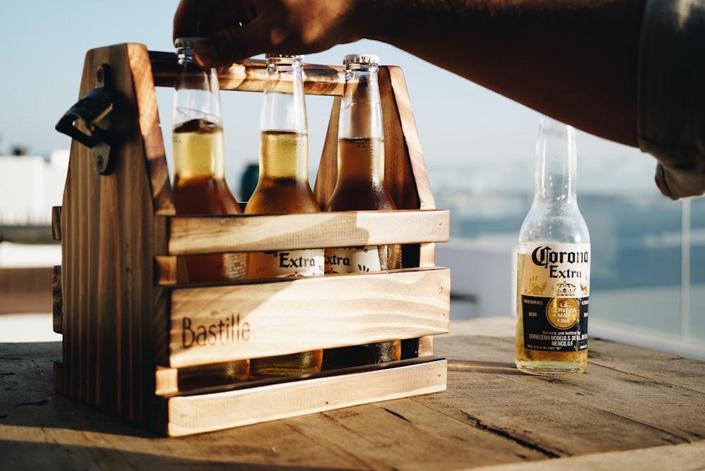 corona extra beer bottles on brown wooden crate