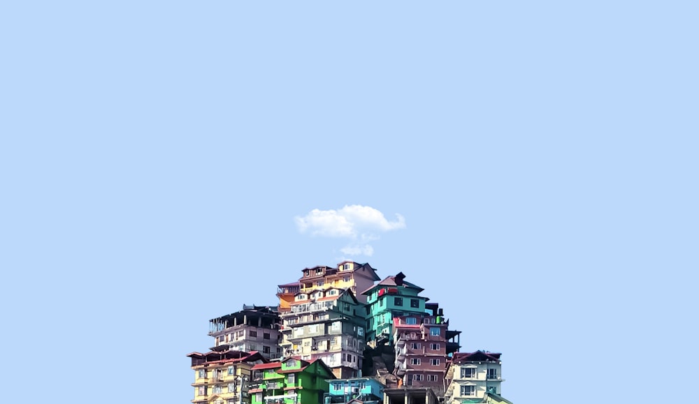 green and brown concrete building under blue sky during daytime