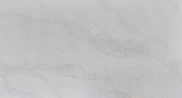A smooth, polished surface with a light gray marble pattern. Subtle veins in a slightly darker shade run across the surface, adding an elegant texture to the stone.