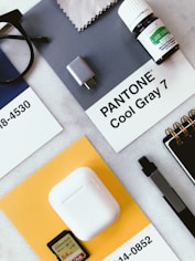 white usb flash drive on white printer paper