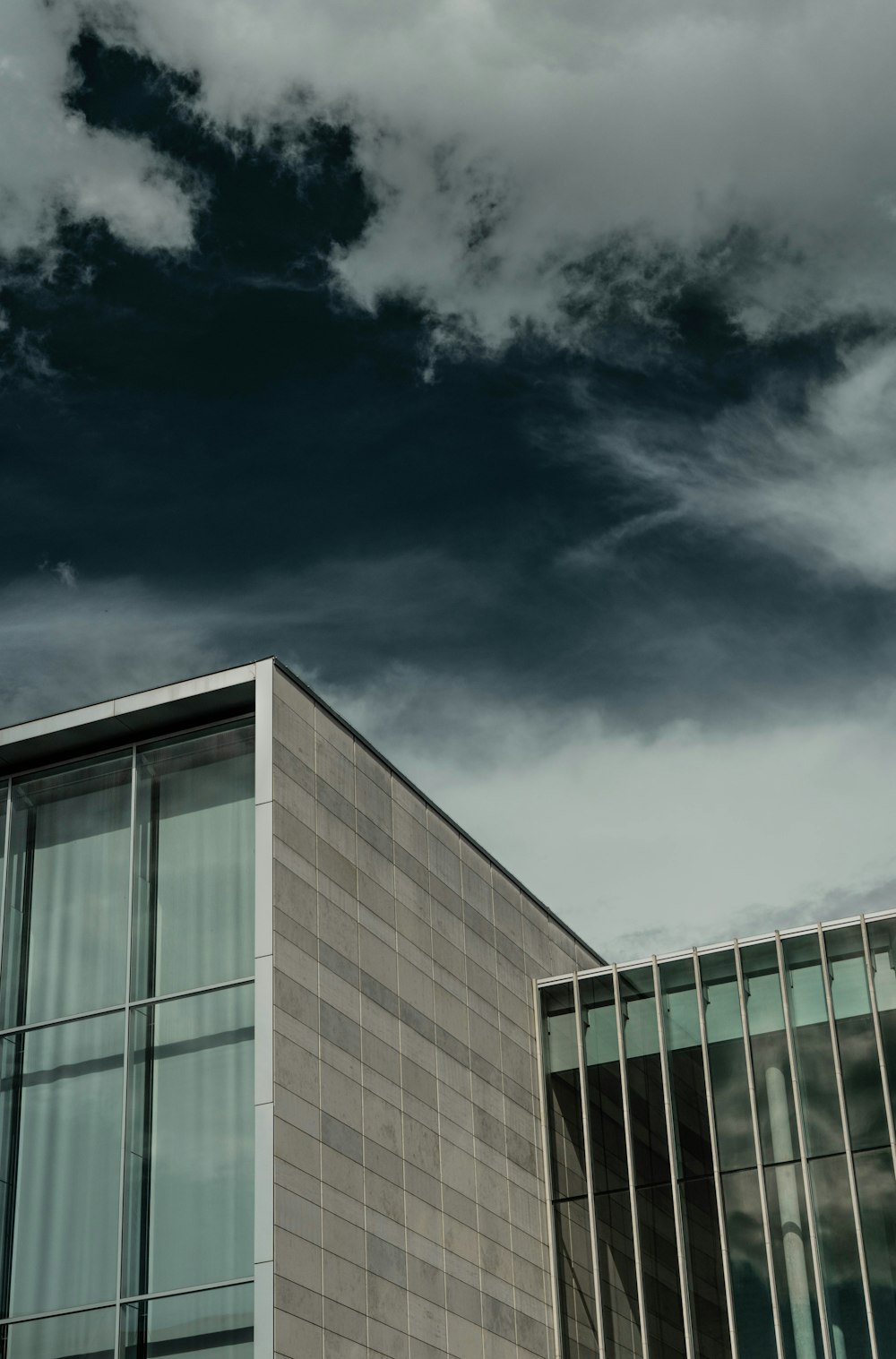 gray concrete building under blue sky during daytime