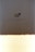 A primarily beige and dark brown image with a symbol in the center indicating image upload, featuring a small icon of a picture with a plus sign surrounded by text reading 'Drop your images here or Browse'. The bottom portion has a light leak effect.