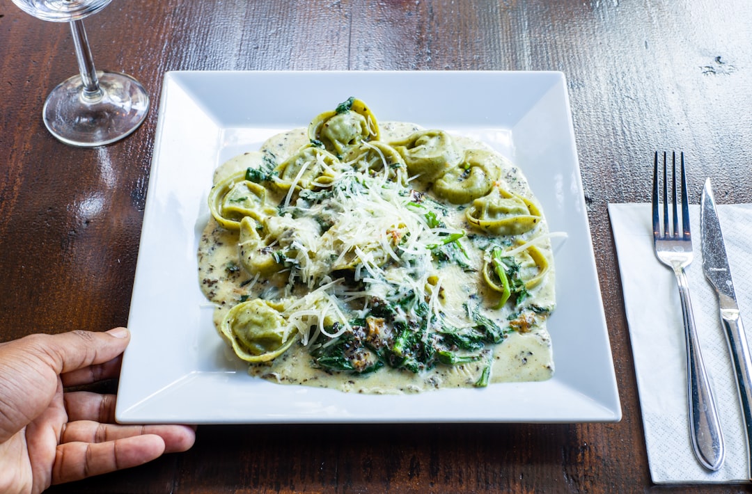 green vegetable dish on white ceramic plate