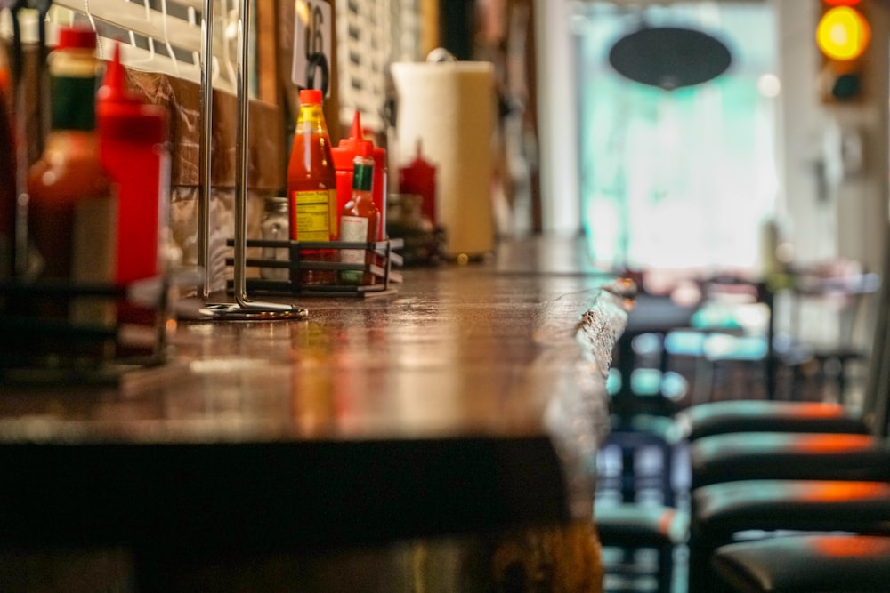 selective focus photography of bottles on table