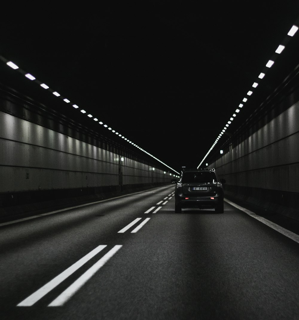 black car on gray road