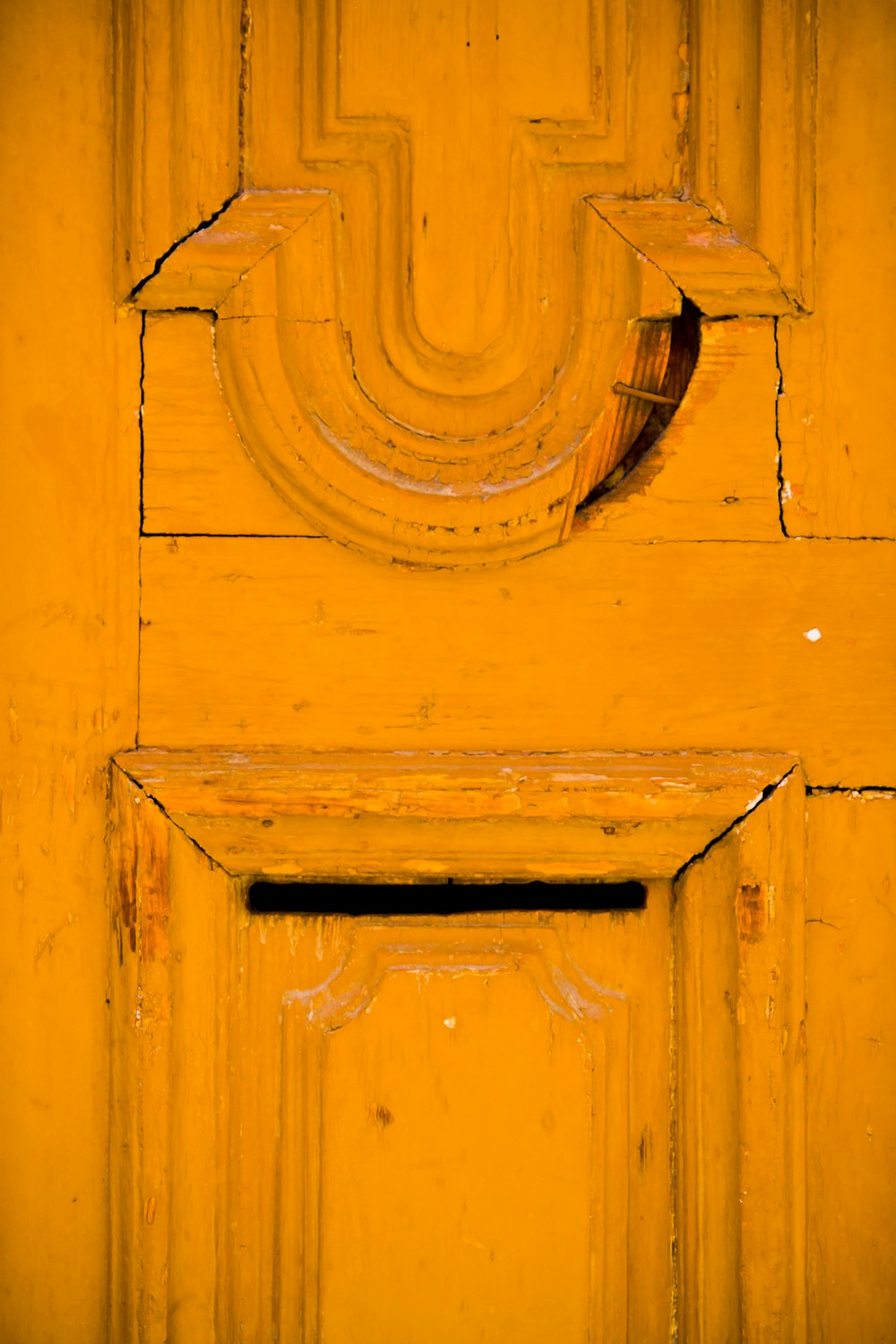 brown wooden door with gold door knob