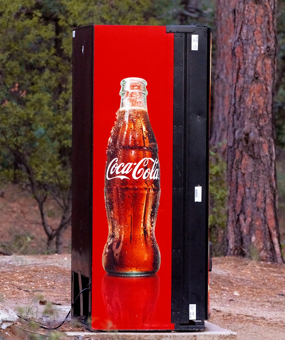 red coca cola glass bottle