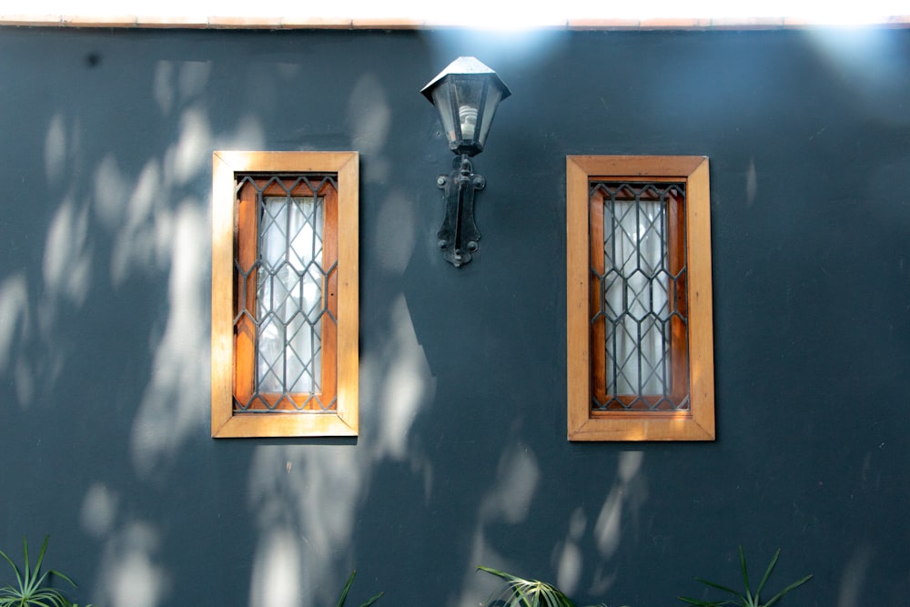 brown wooden framed glass window