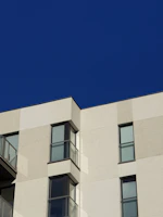 Modern residential building facade in Cuiabá with clear blue sky