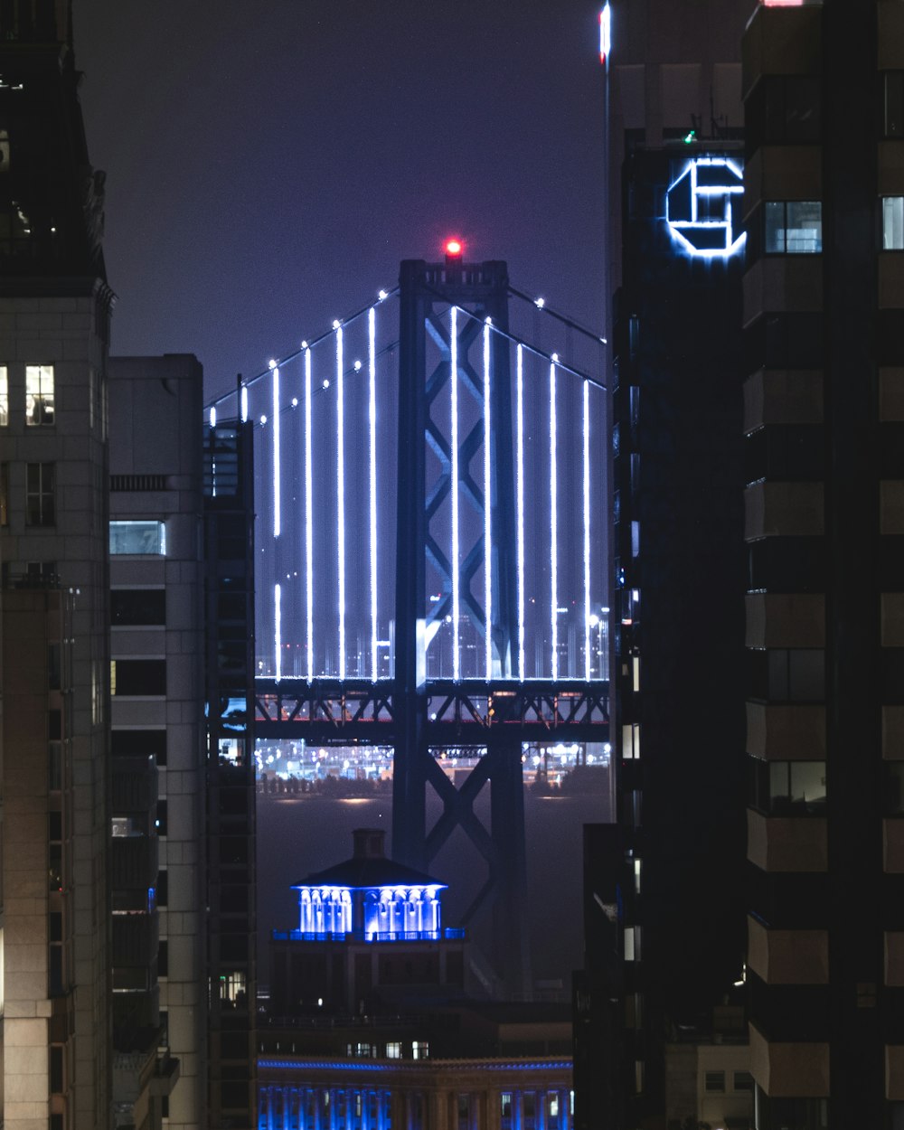 white and black high rise building during nighttime