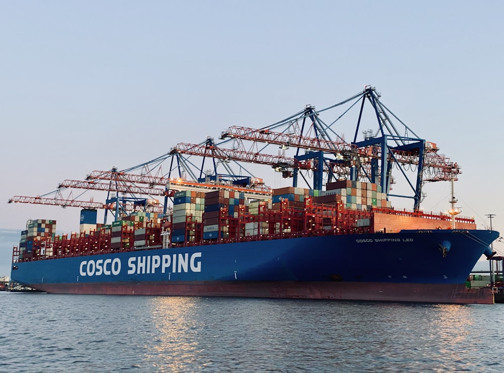 cargo ship on dock during daytime