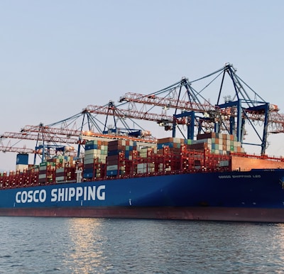 cargo ship on dock during daytime